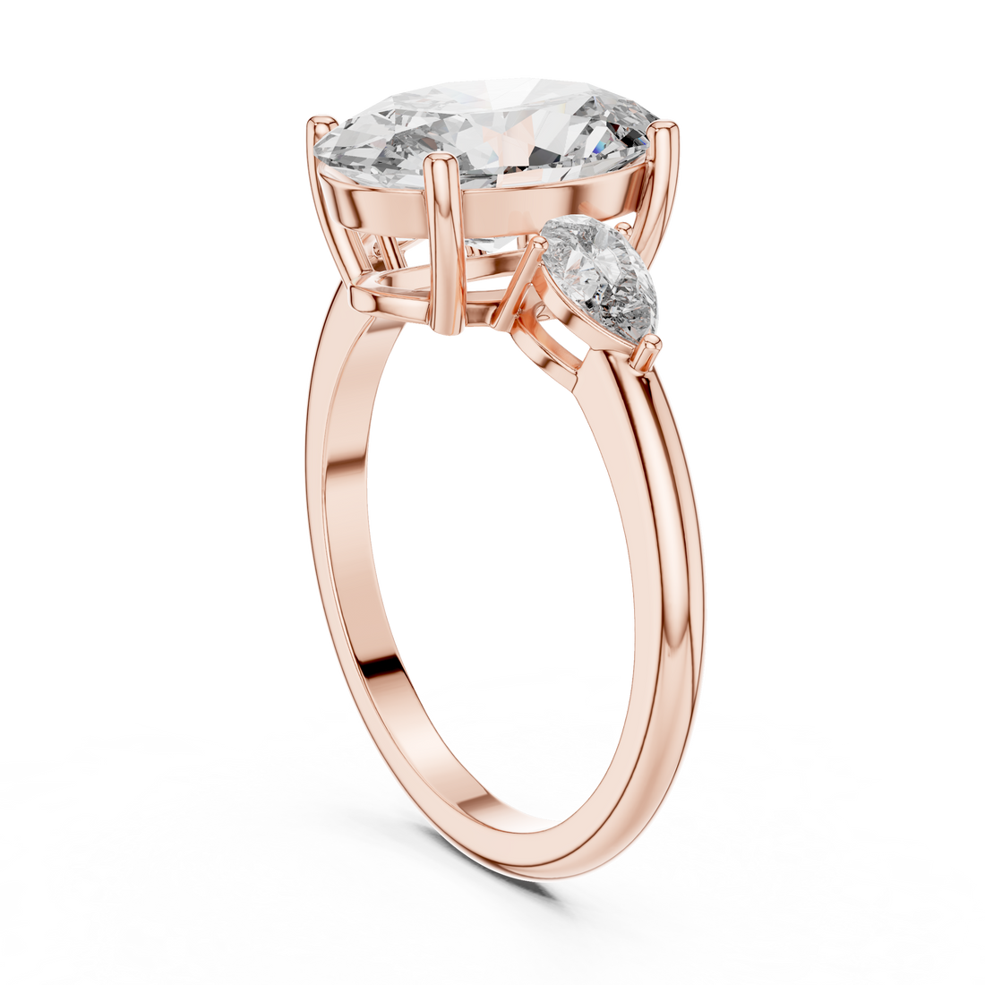 Oval Three-Stone Engagement Ring with Pear Accents