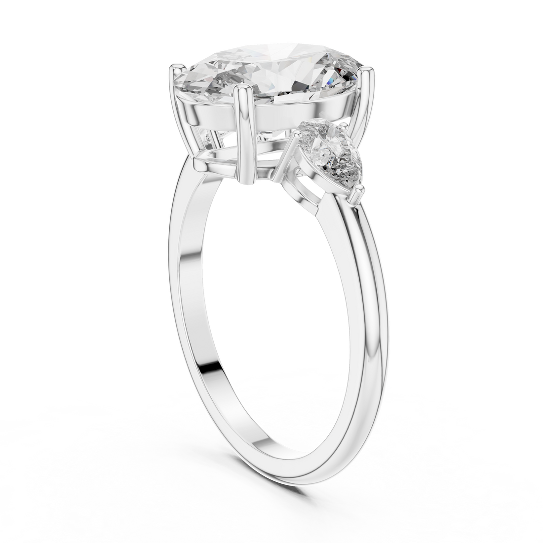 Oval Three-Stone Engagement Ring with Pear Accents