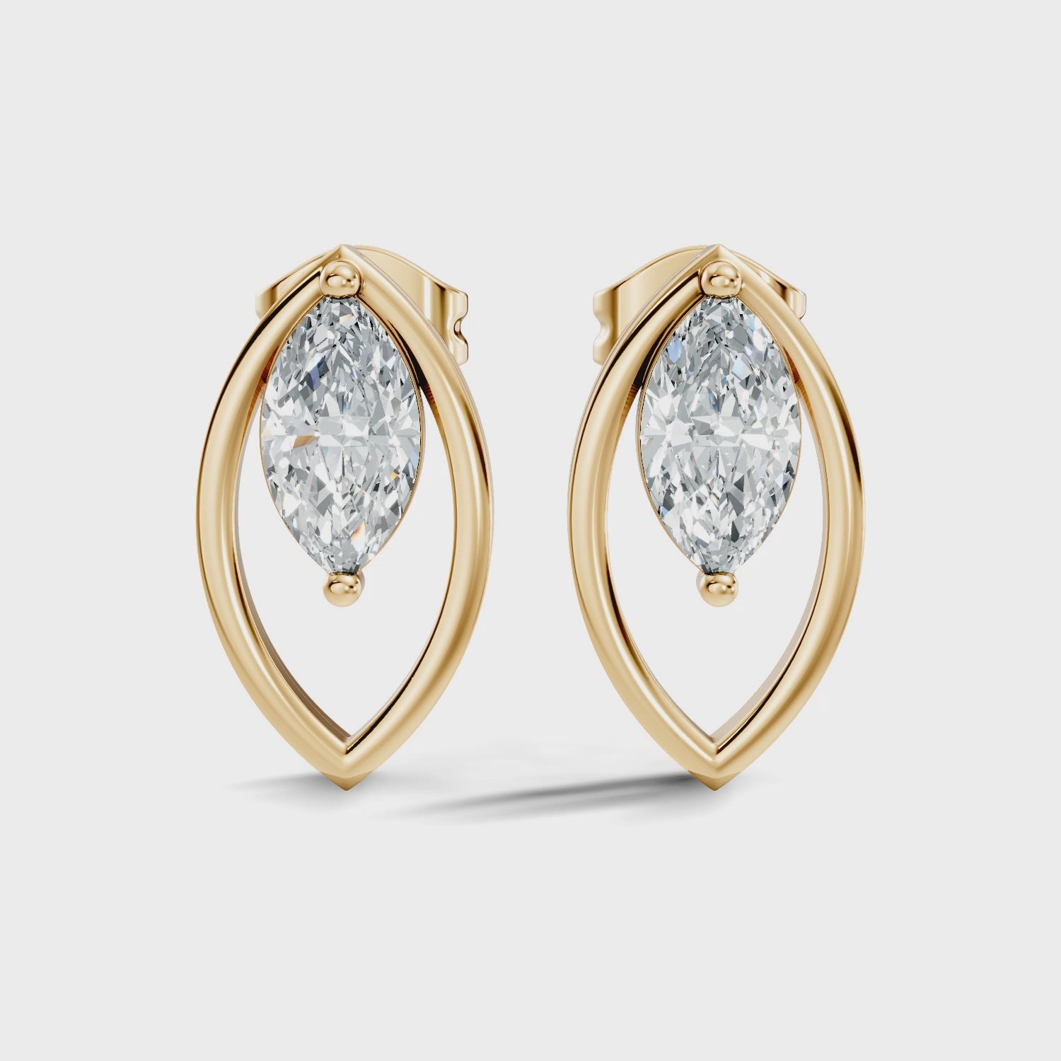 Marquise Cut Solitaire & Open Leaf Frame Stud