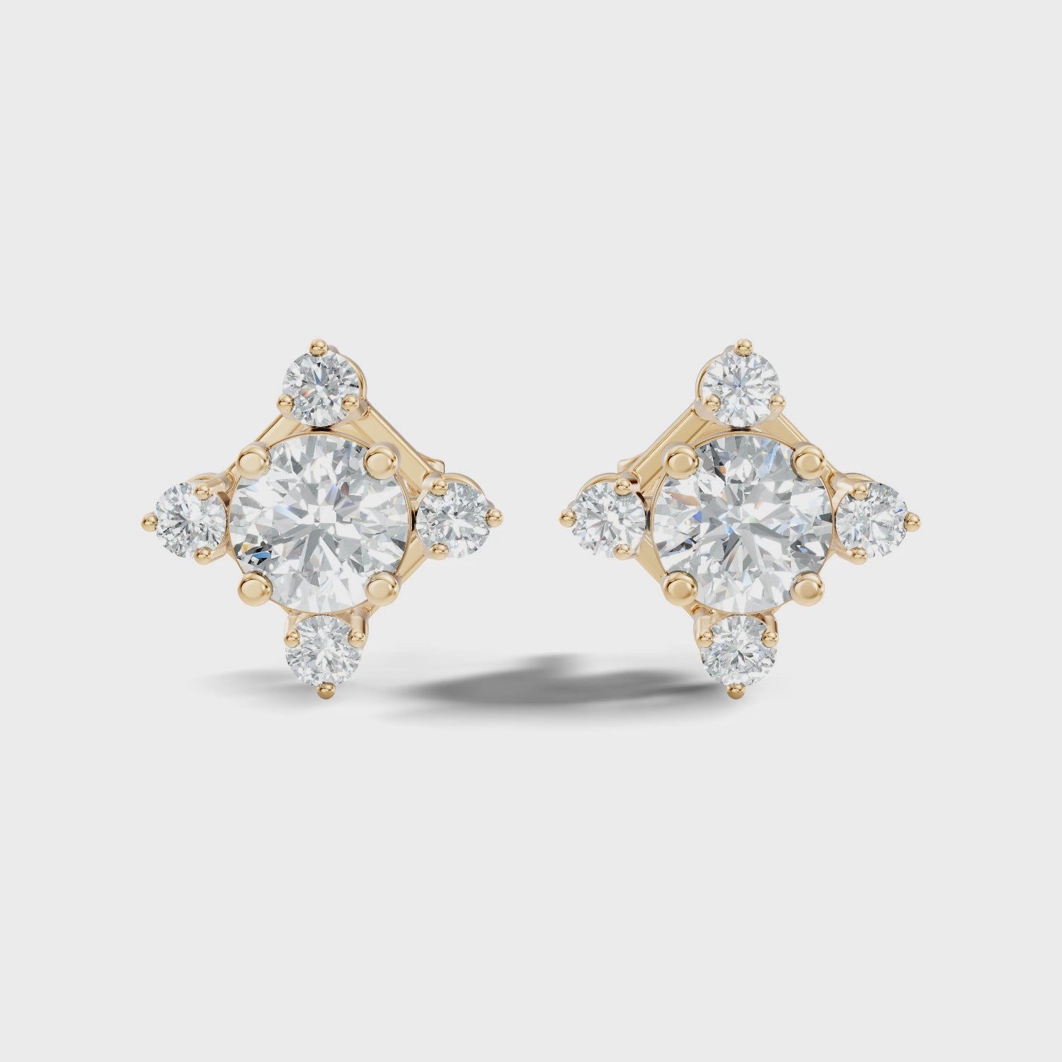 Diamond Solitaire & Four-Point Compass Halo Stud