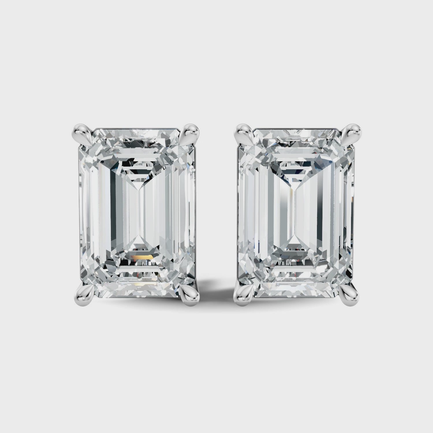 Emerald Cut Diamond Four-Prong Solitaire Stud (6.41 TCW)