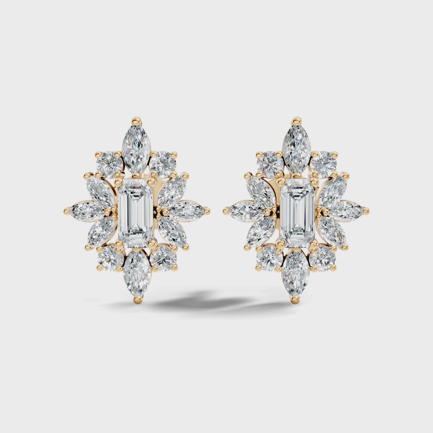 Emerald Cut Solitaire & Marquise Sunburst Cluster Stud