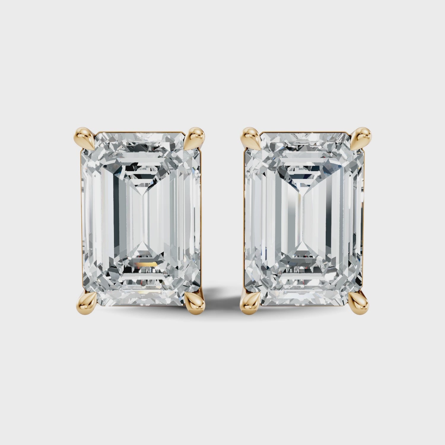 Emerald Cut Diamond Four-Prong Solitaire Stud (6.41 TCW)