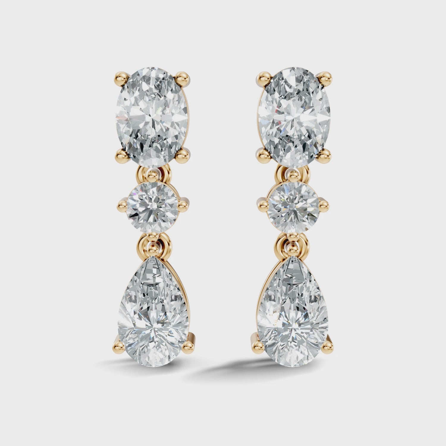 Oval, Round & Pear Three-Stone Linear Diamond Drop Earrings