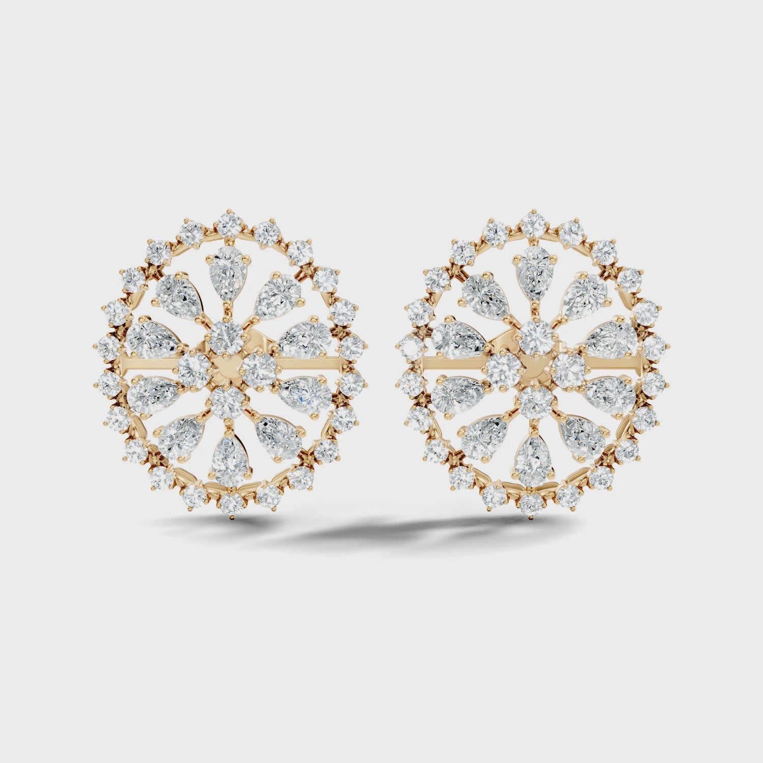 Pear Solitaire & Pave Outer Halo Wheel Diamond Stud