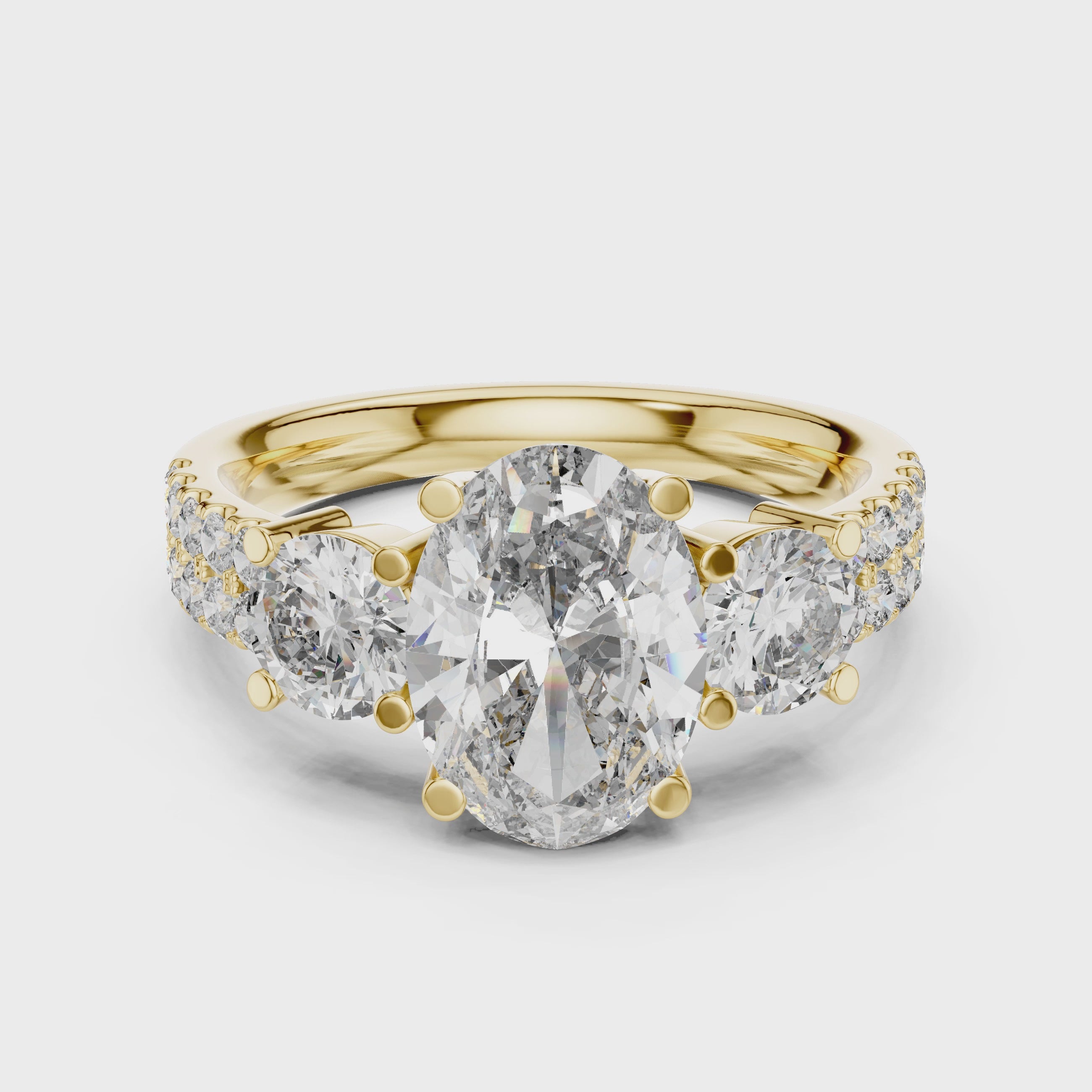 Three-Stone Oval & Round Diamond Engagement Ring with Pave Shank