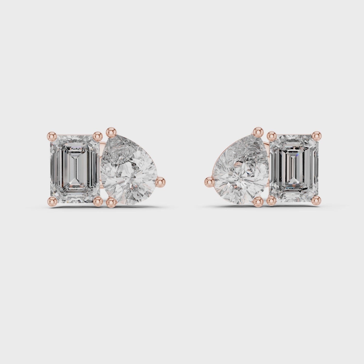 0.80ct Pear & 1.00ct Emerald Solitaire Diamond Studs