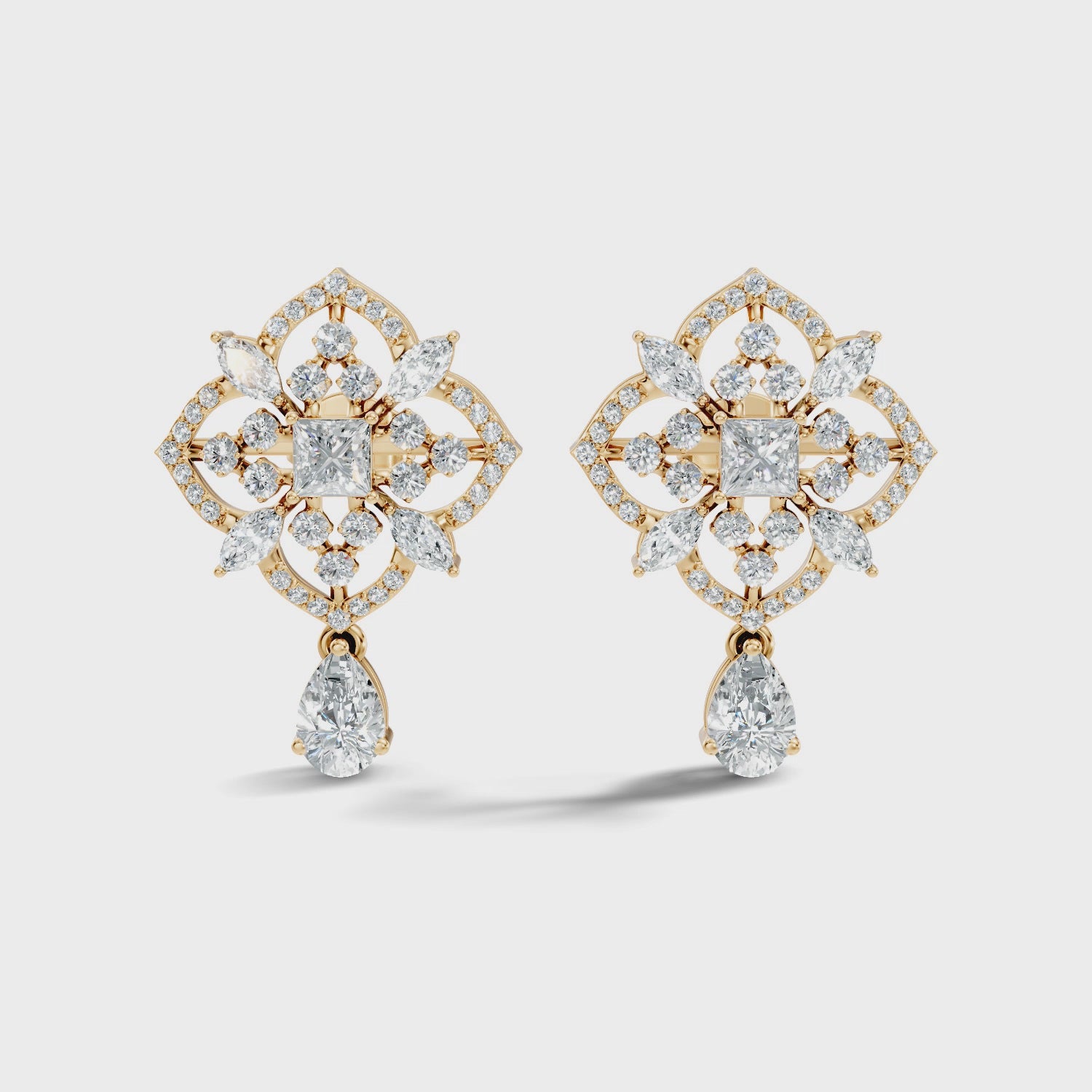 Princess Solitaire & Openwork Quatrefoil Pear Drop Earrings