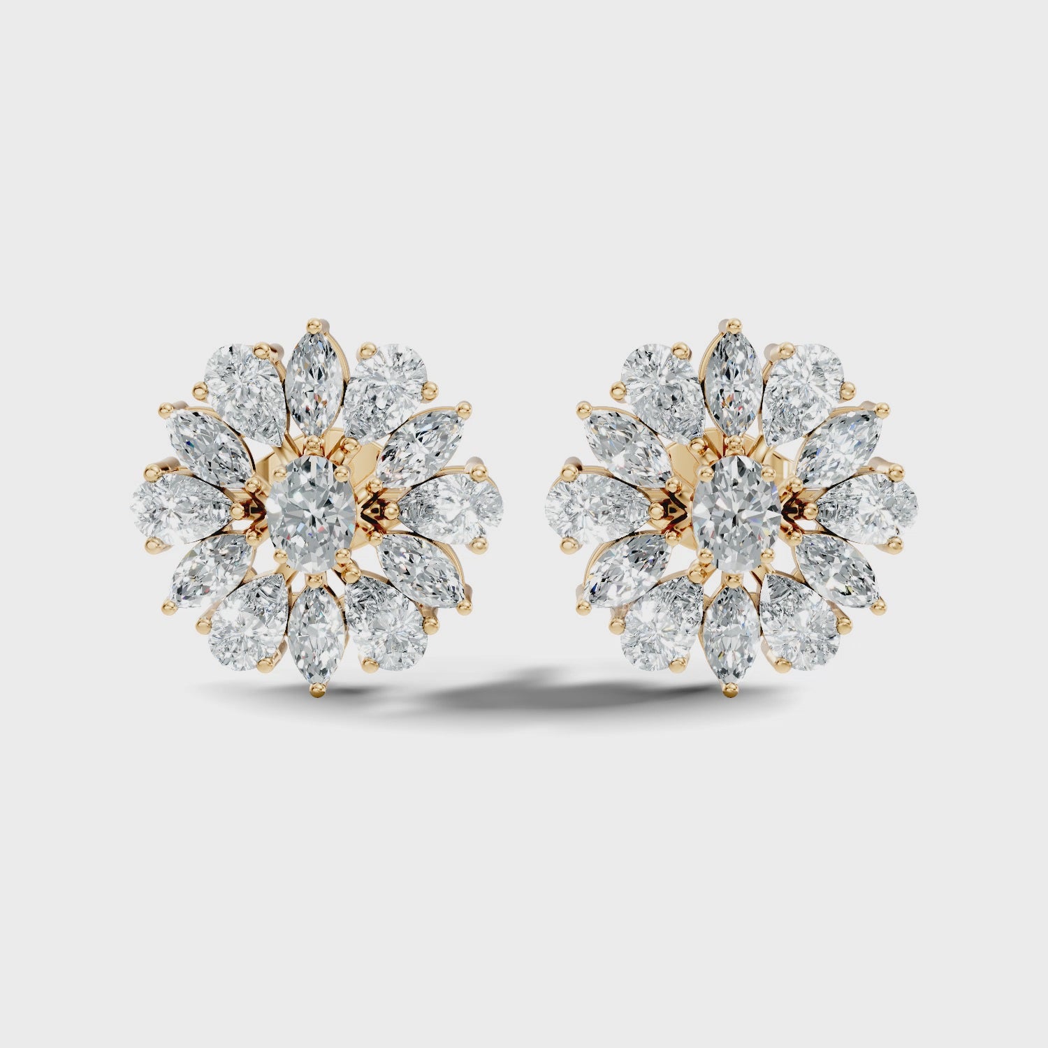 Oval Solitaire & Sunburst Pear Marquise Diamond Stud