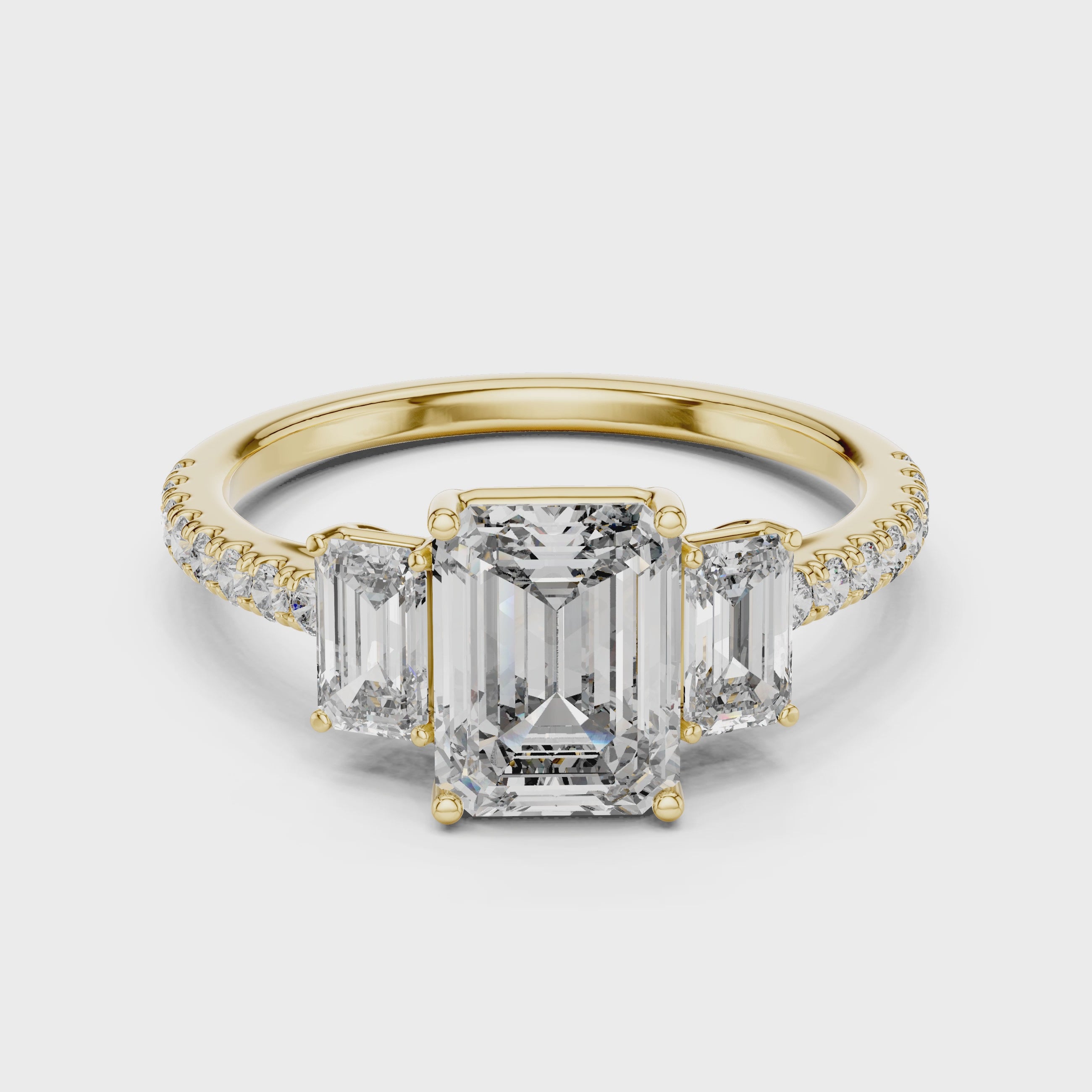 Three-Stone Emerald-Cut Diamond Engagement Ring with U-Cut Pave Shank