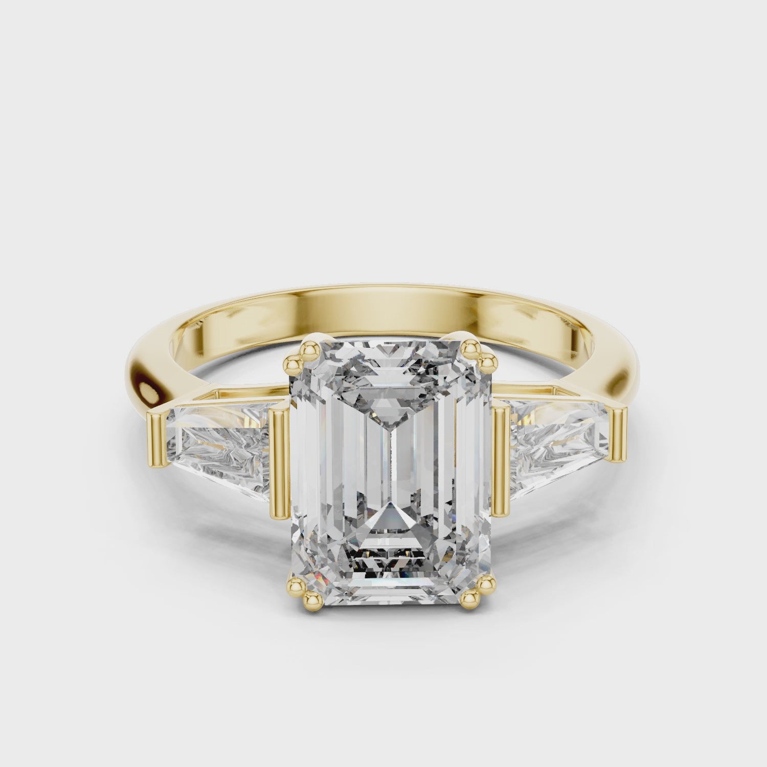 Emerald Cut Solitaire & Tapered Baguette Side Stones Diamond Ring