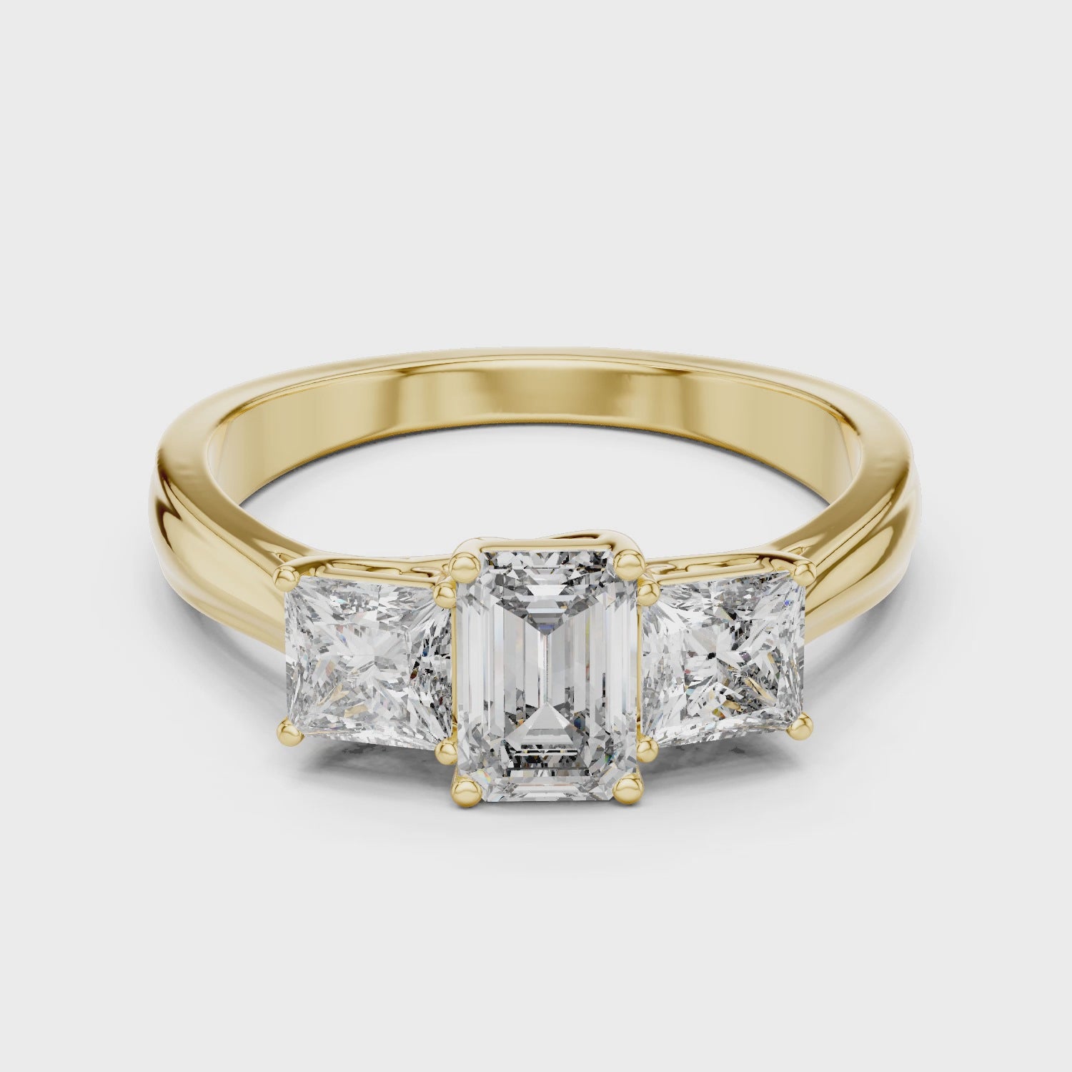 Three-Stone Emerald & Princess Cut Engagement Ring