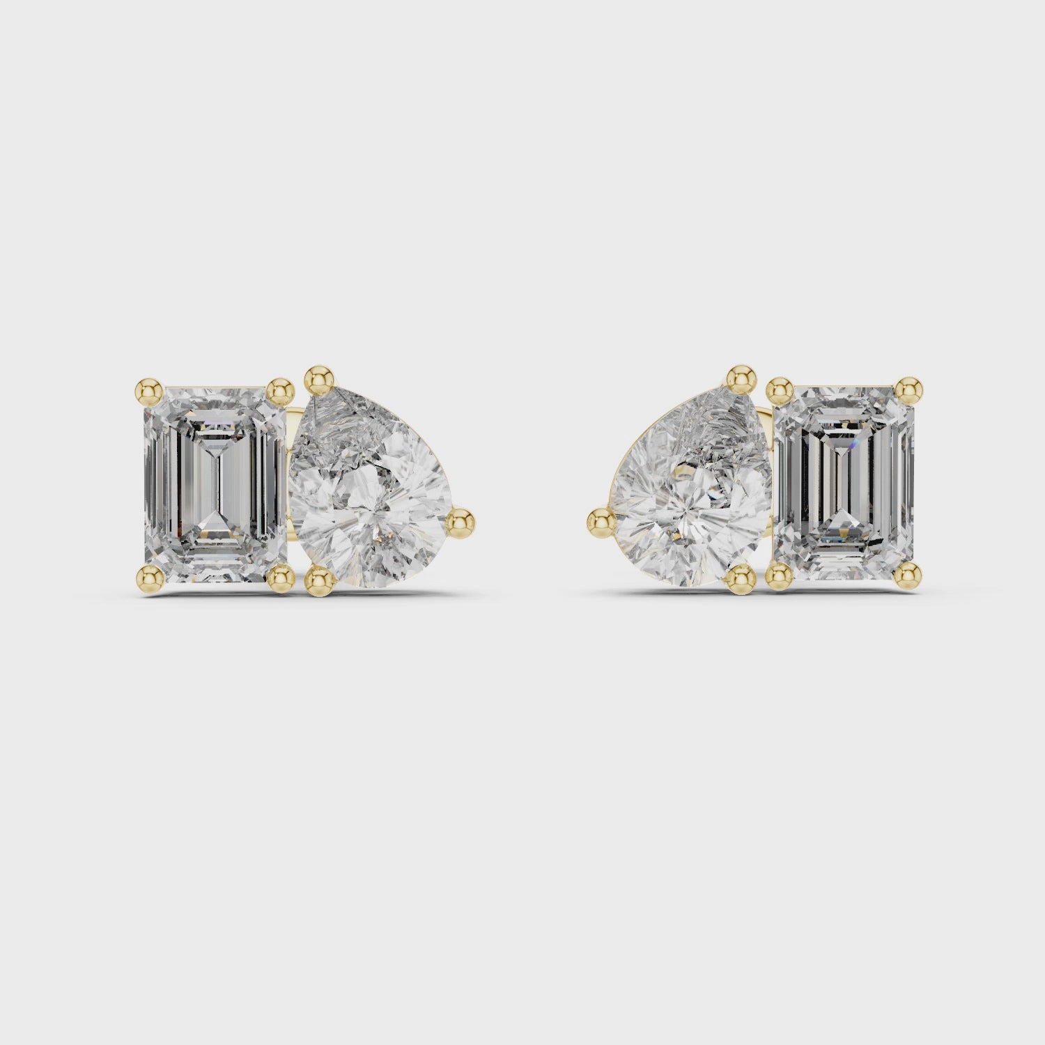 0.80ct Pear & 1.00ct Emerald Solitaire Diamond Studs