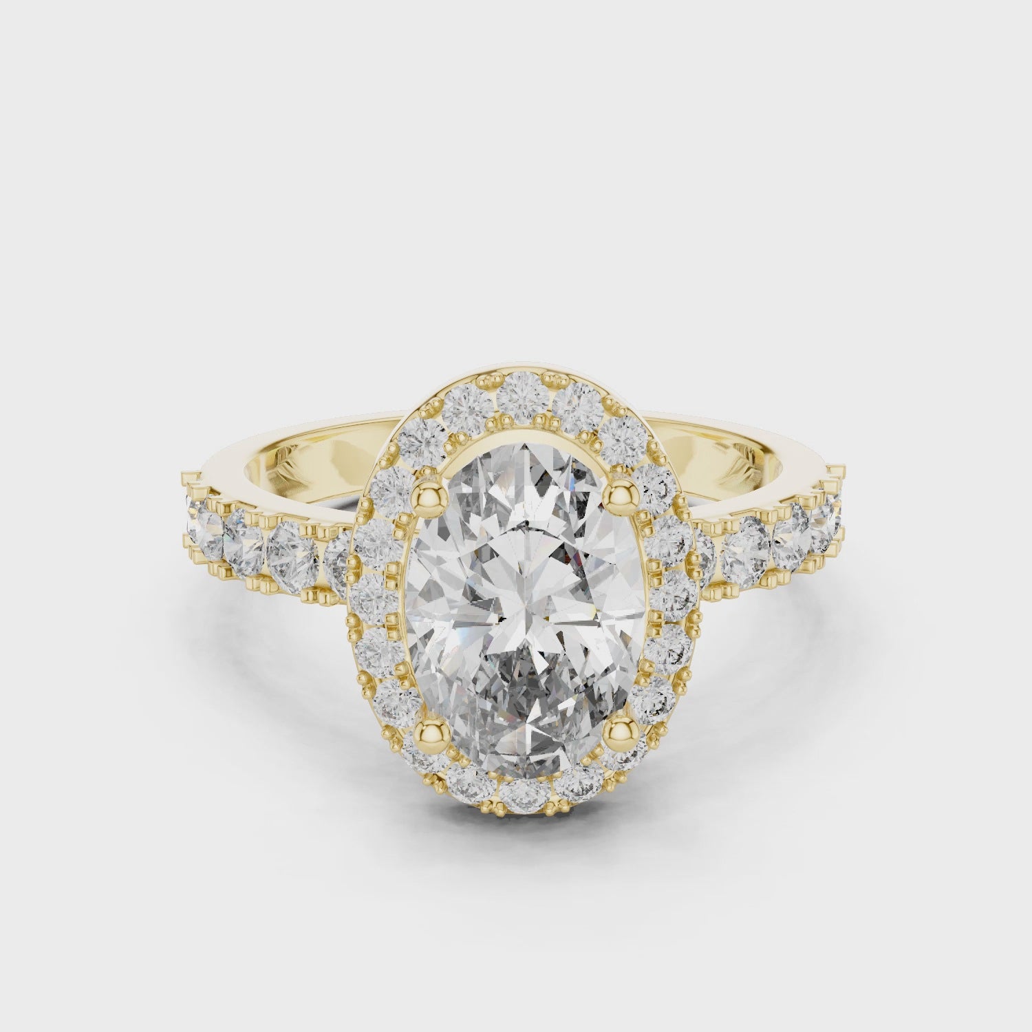 Oval Halo Engagement Ring with Shared-Prong Accent Shank
