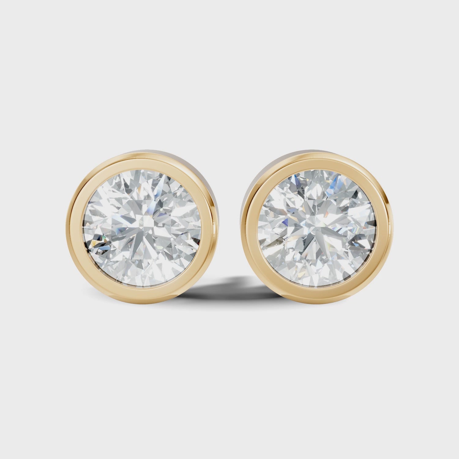 Round Diamond Bezel Set Solitaire Stud Earrings (0.80 TCW)