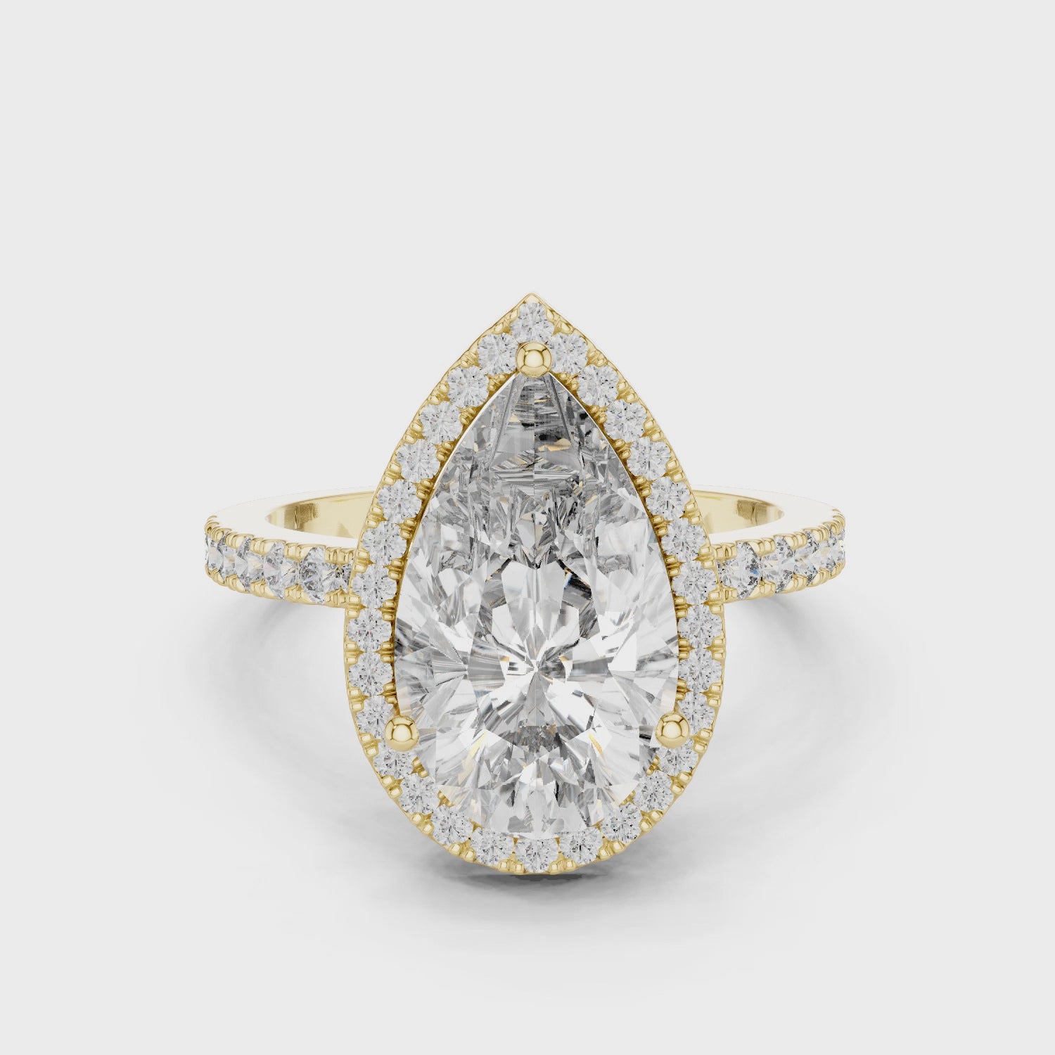 Pear-Cut Halo Engagement Ring with Pave Band