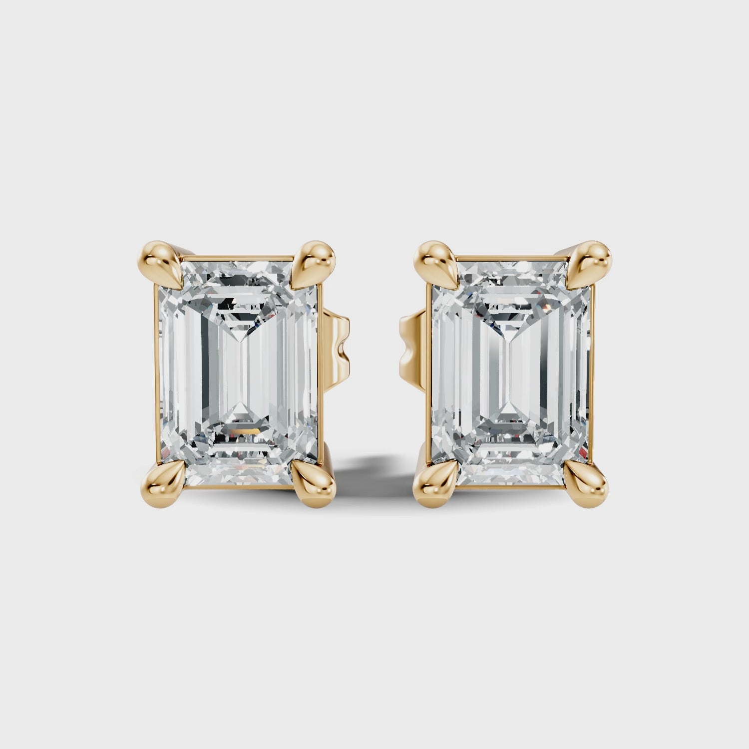 Classic Emerald Cut Solitaire Diamond Stud