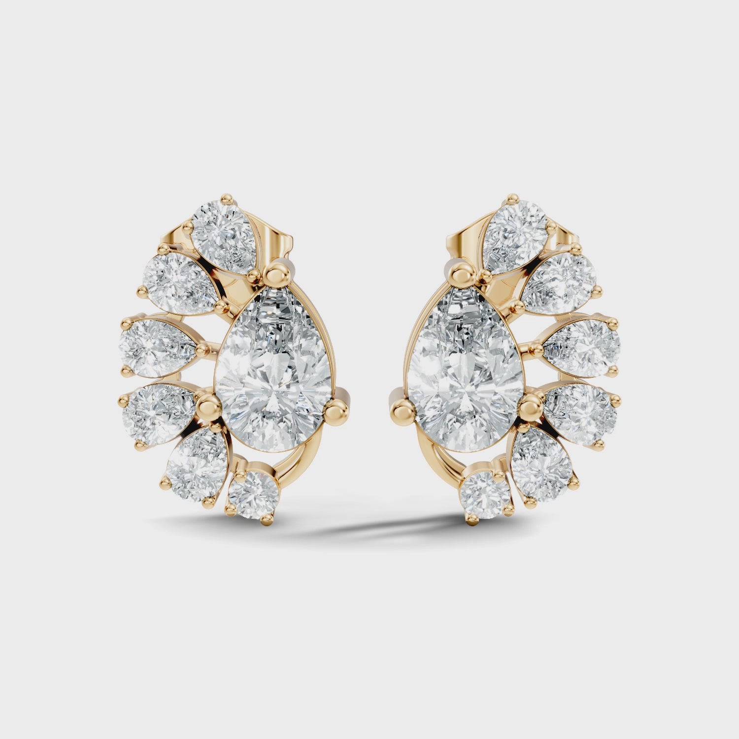 Pear & Round Diamond Asymmetric Fan Cluster Stud