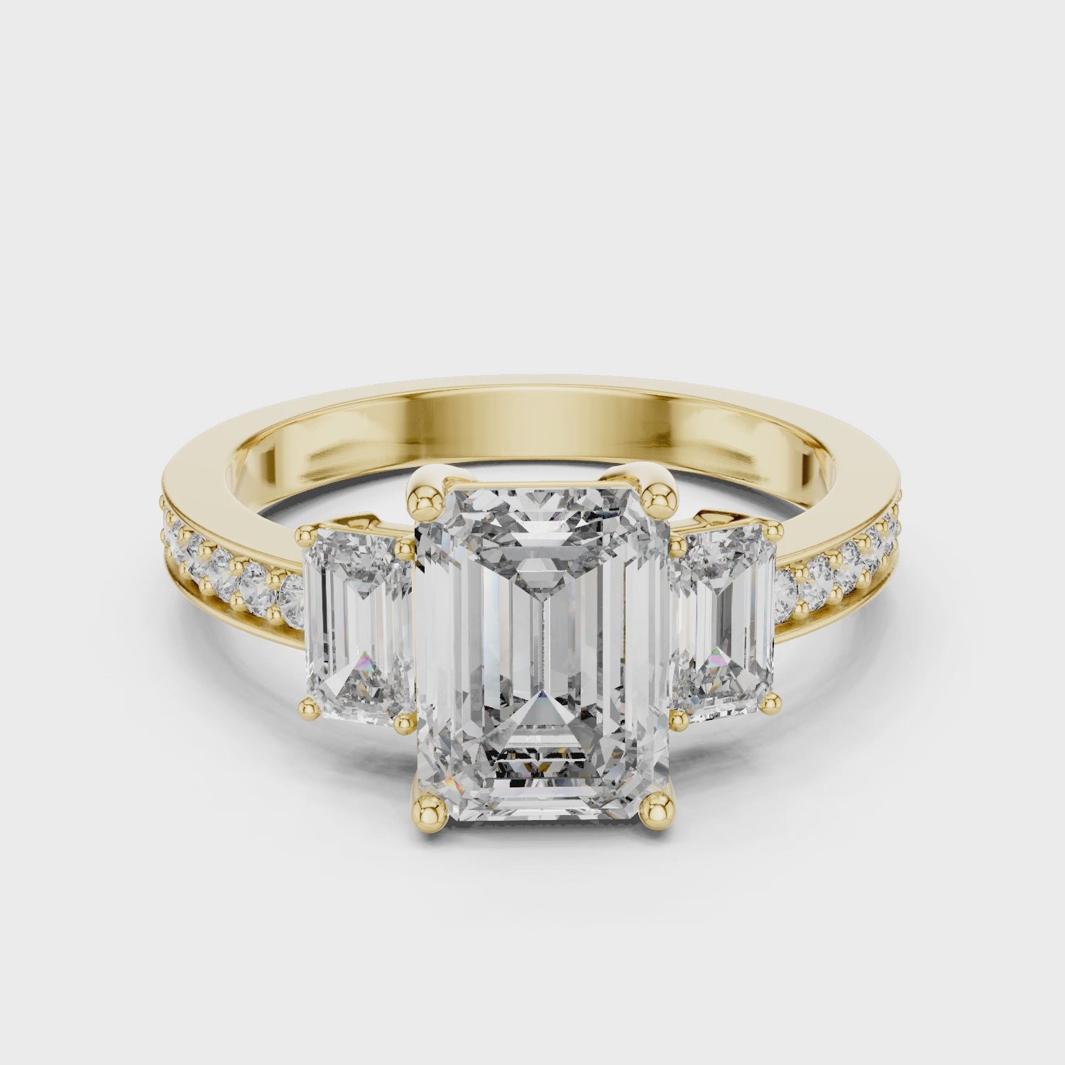 Emerald-Cut Three-Stone Ring with Pave Shank