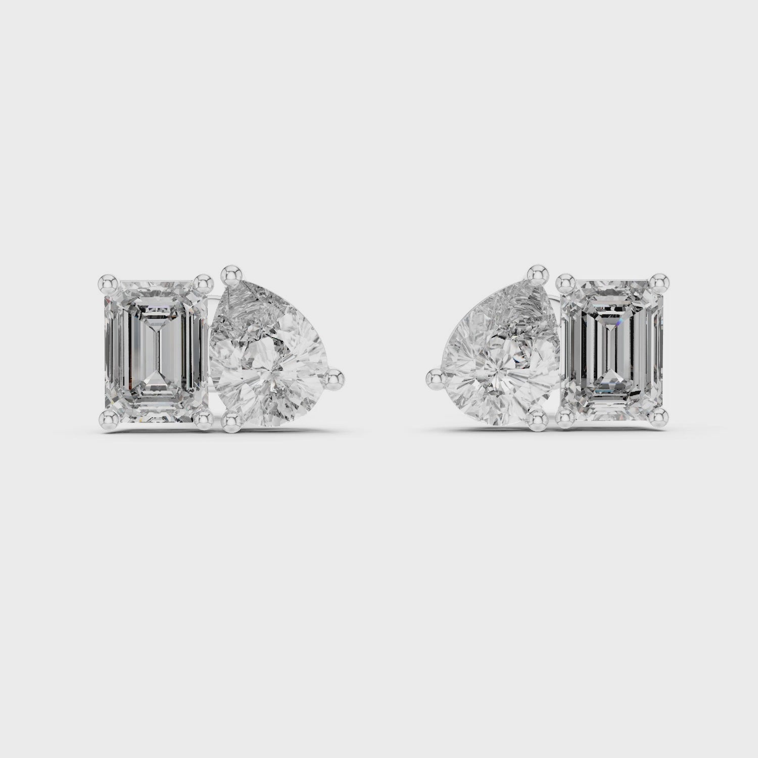 0.80ct Pear & 1.00ct Emerald Solitaire Diamond Studs