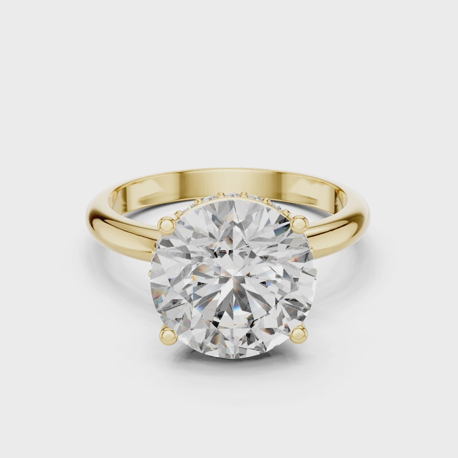 Brinda Gold and Diamonds Round Solitaire & Hidden Crown Halo Diamond Ring