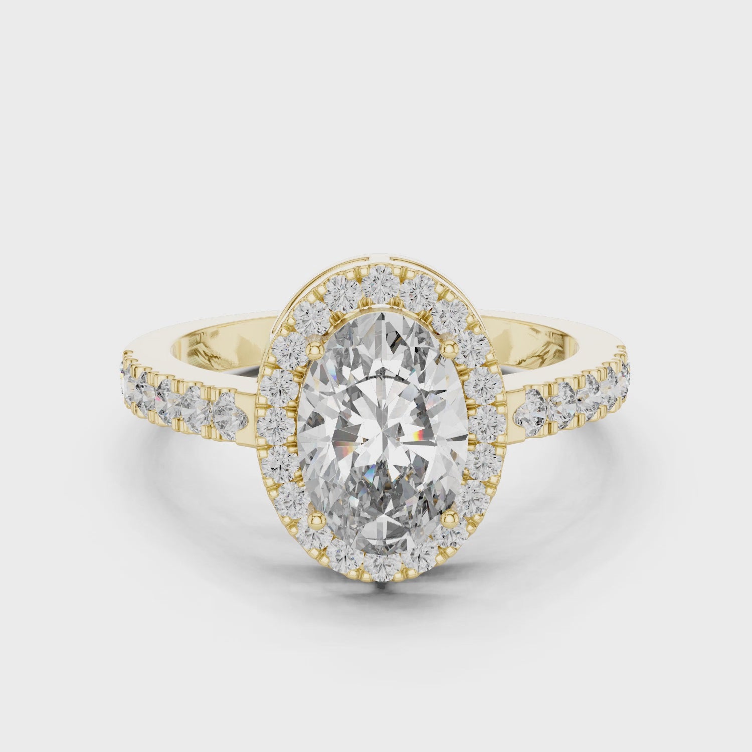 Brinda Gold and Diamonds Oval Solitaire & Pavé Halo Band Diamond Ring